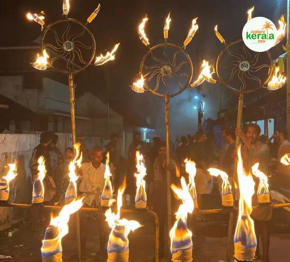 Kerala temple decorated with lamps and colorful lights during Navarathri festival night celebrations.