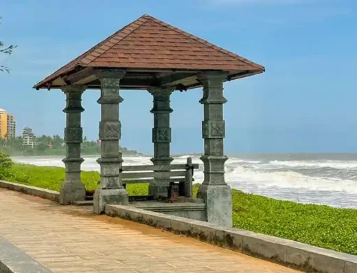 Golden sandy shoreline at Payyambalam Beach, Kannur