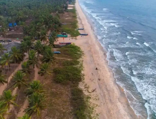 Golden sandy shoreline at Payyoli Beach, Kozhikode